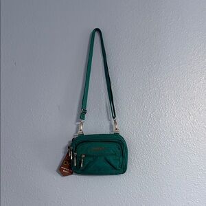 Teal triple zip bag from Baggallini